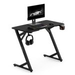 Mesa Gaming Sense7 Vamo 100x50 cm Acero y textura fibra carbono negra