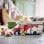 Lego City Autocaravana Aventurera de Vacaciones, Furgoneta de Juguete con Minifiguras y Accesorios