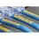 Brother TZE-SL651, Etiquette autolaminée, Noir sur Or, 2,4 cm, 8 m, Jaune