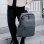 Mochila para portátil 15.6" gris repelente al agua con puerto USB y doble compartimento