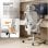 Silla ergonómica Sense7 Noxo respaldo malla reposabrazos abatibles gris y negro