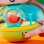 Sonoro Musical Bright Starts Grab & Giggle Monkey com Mais de 20 Sons e Luminoso
