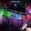 Scrivania Aosom reversibile con prese elettriche, luci LED RGB e supporto monitor