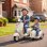 Moto eléctrica infantil Aiyaplay Vespa con asiento lateral y arranque suave