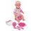 Bambola SIMBA New Born Baby 43 cm vinile con bere e pipì 8 pezzi