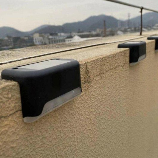 Conjunto de 4 luzes solares pretas para exteriores Autrucker — Luz quente, impermeáveis