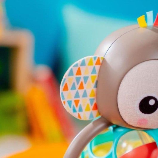 Sonoro Musical Bright Starts Grab & Giggle Monkey com Mais de 20 Sons e Luminoso