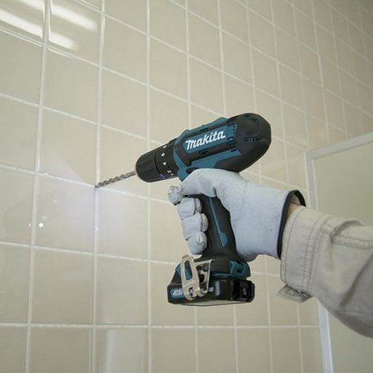 Makita HP331DSAE Taladro Percutor Inalámbrico + Batería 10.8V 2.0Ah + Maletín